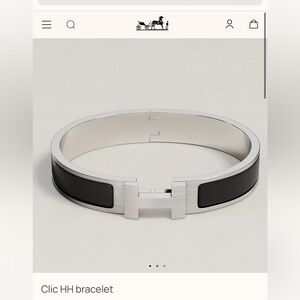 Authentic Men’s black and silver Clic HH bracelet